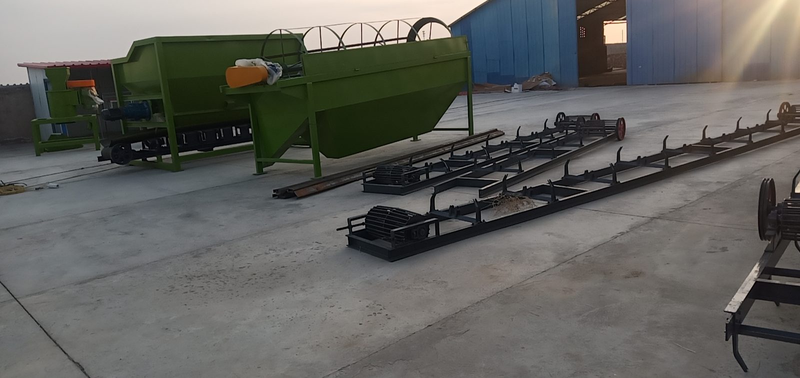 Compost fertilizer manufacturing line with screening and bagging